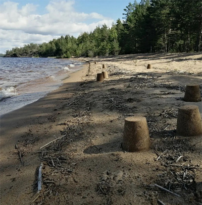 A pop up Kakutus sandcastle action happened during a three day Forest Camp retreat in summer 2023 at Rokansaari Island, Lake Saimaa.